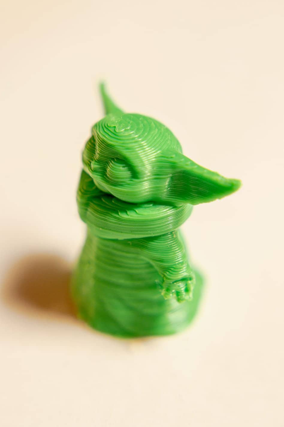 3d printed green creature toy
