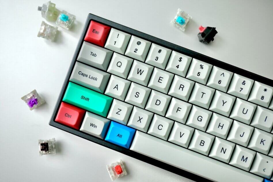keyboard with colorful keys and mechanical switches on the desk
