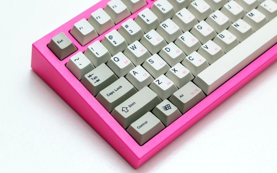 pink mechanical keyboard on white background left side