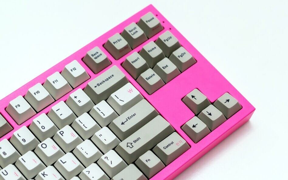 pink mechanical keyboard on white background right side