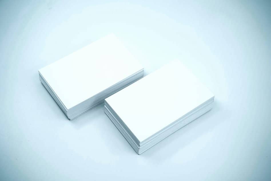 two white paper sheet packages